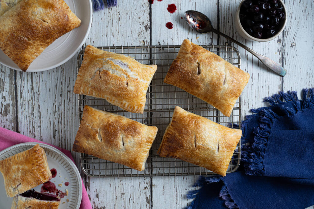 Overhead image of four hand pies for an easy potluck dessert