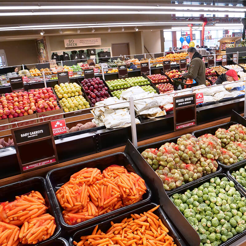 Fresh produce is available at Farm Boy Walkers Line in Burlington. Image shows various colorful produce displayed.