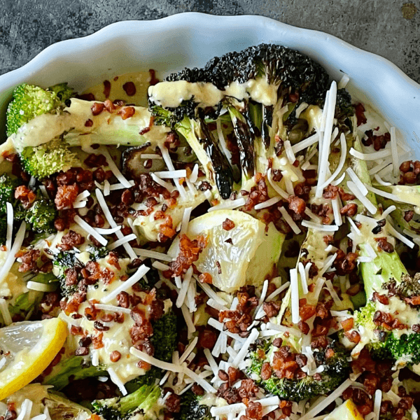 overhead image of grilled broccoli caesar salad for vegan BBQ