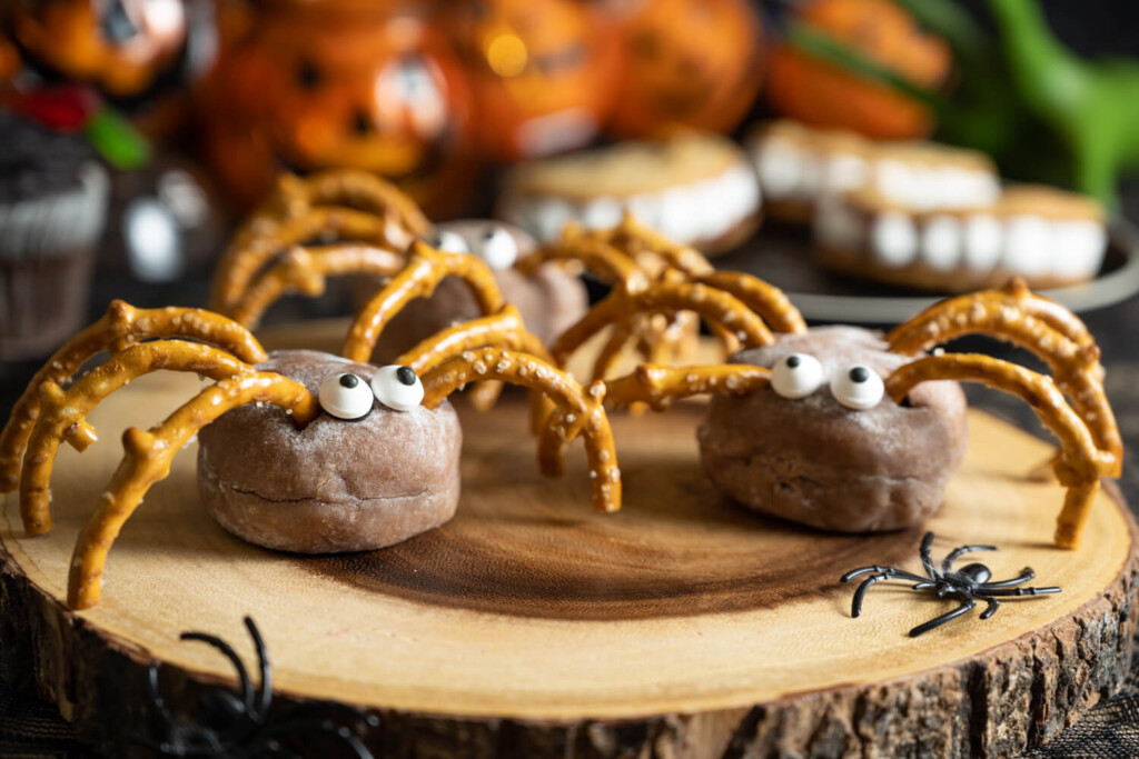 Cross-section of log with donut hole spiders made with pretzel legs