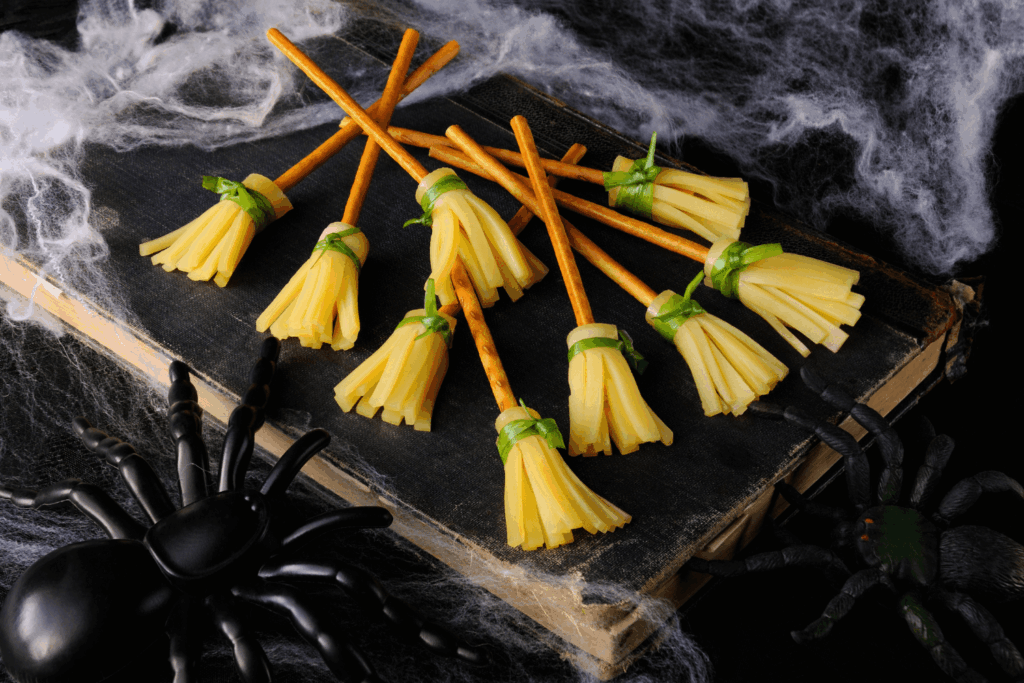 Witch broom made of cheese and pretzel straw. 