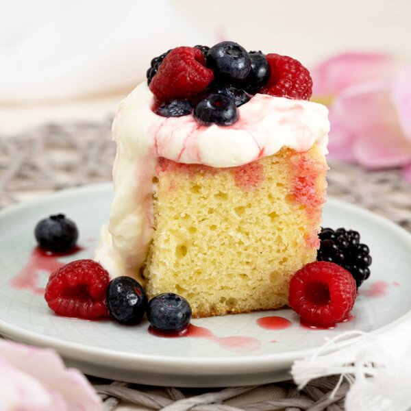 Indulge in the sweet finale with our Lemon Ricotta Cake. Topped with Lemon Whipped Cream and a medley of Mixed Berries, it's the perfect ending to a memorable meal celebrating Mom.