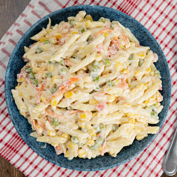 Long Weekend Feast Meal: Picnic Pasta Salad filled with a medley of vegetables including corn and peas.