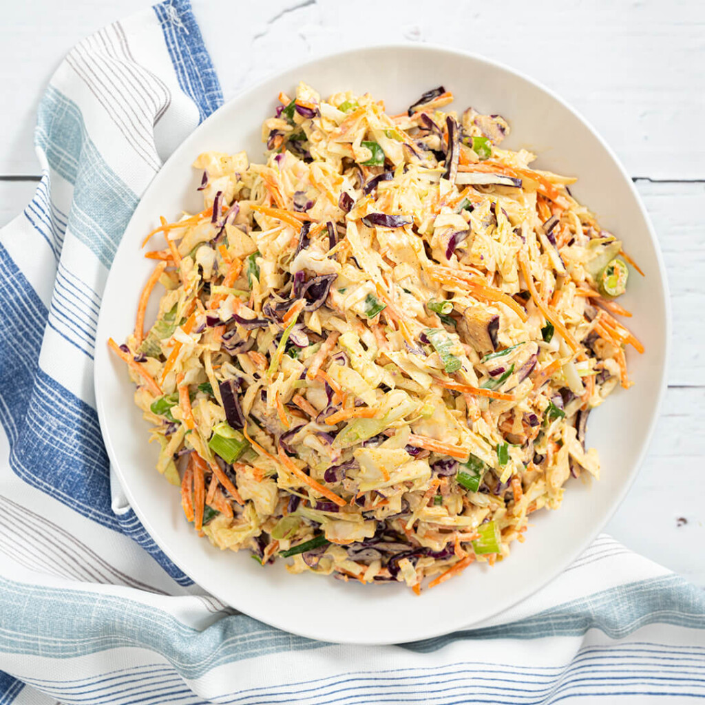 Alongside the hearty BBQ fare is a Smoky Coleslaw filled with shredded cabbage, carrots, green onions, and a touch of cheddar cheese.