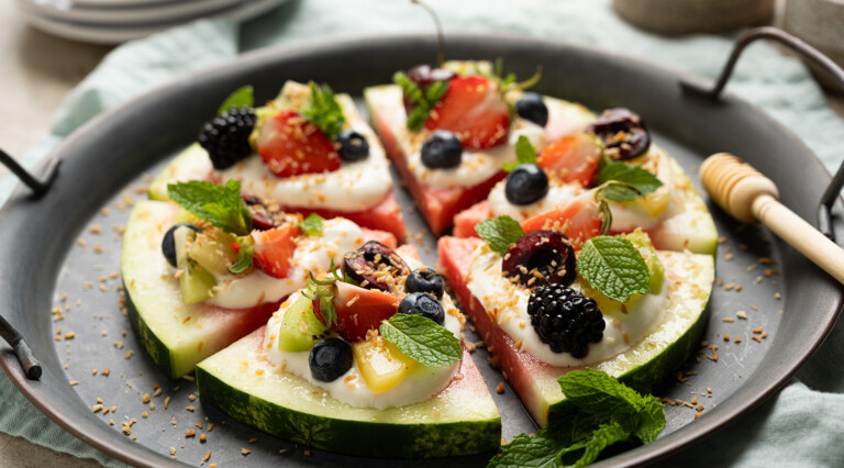 Fruity Watermelon Pizza with topping and garnish.