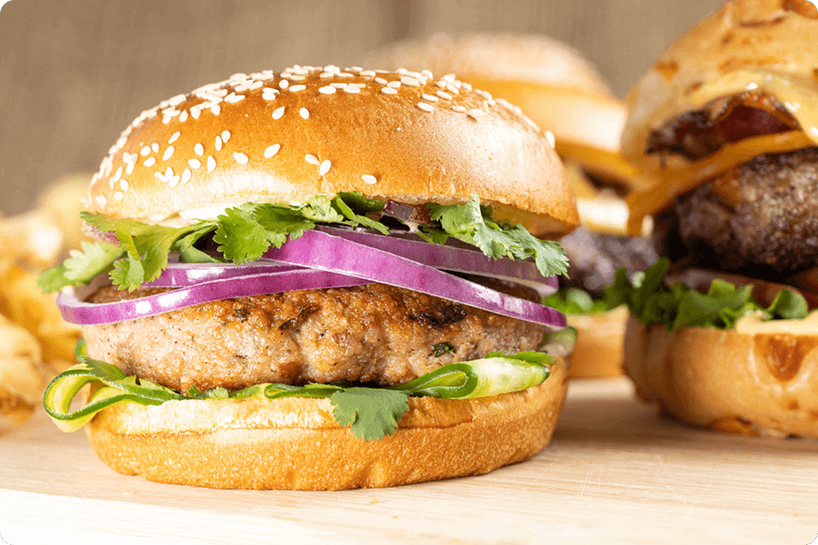 The heart of this burger lies in its patty, meticulously fashioned from the finest, high-quality turkey meat and a medley of authentic Thai ingredients. The result is a patty bursting with flavor and succulence.