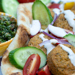 On those busy weeknights when you find yourself scrambling to get dinner on the table, these Falafel Wraps cannot be beat, both in flavour and speed of preparation! A couple of pre-made items put together, a few vegetables chopped and you will have a meal on the table in 20 minutes or less.