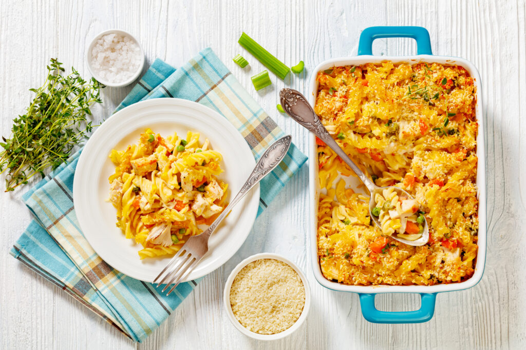Chicken casserole with carrots and peas.
