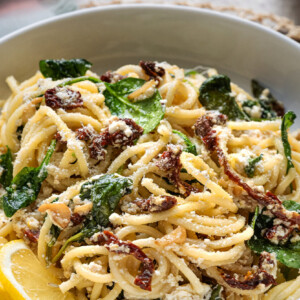 This lemony and cheesy pasta dish is sure to brighten any winter day! It is super simple to put together and makes a great starter. If you serve it with roast chicken or salmon you will have a beautiful meal on the table in no time. Feel free to swap out the sundried tomatoes for green peas or roasted peppers.