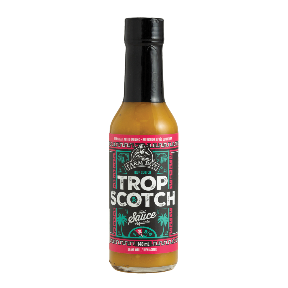 Bottle of Farm Boy Trop Scotch Hot Sauce on white background