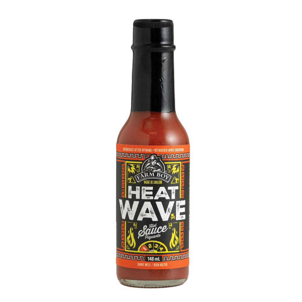 Bottle of Farm Boy Heat Wave Hot Sauce on white background