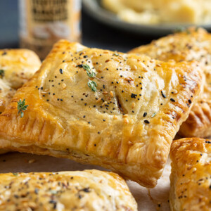 Cheesy, Onion, Leek and Spinach Hand Pies. Packed with flavour, these hand pies are a breeze to put together once you have your prep done.