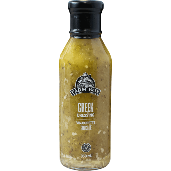 Bottle of Farm Boy Greek Dressing isolated on white background