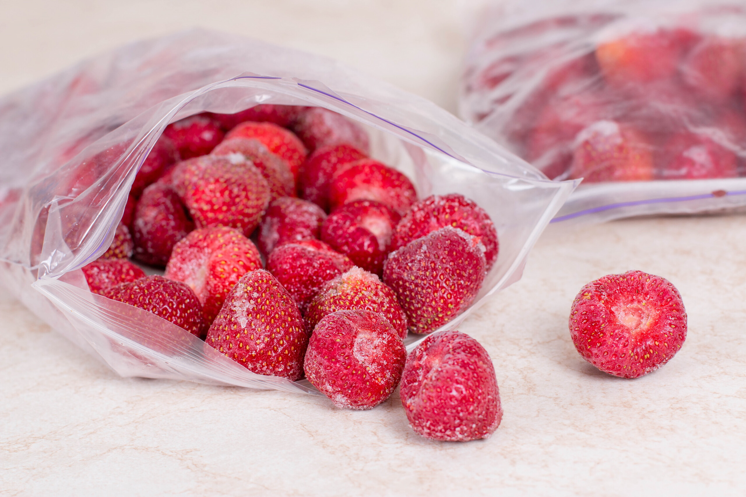 frozen strawberries in plastic bag