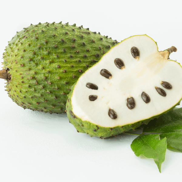 Caribbean fruit: whole and halved soursoup on white background