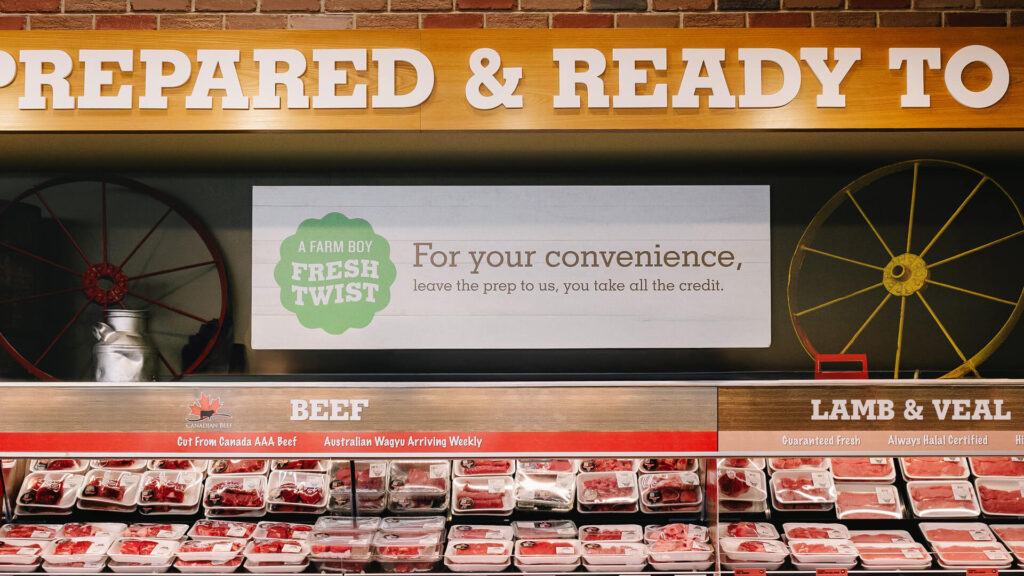 Sign hanging in a store talking about how we do all the prep when it comes to the meats sold at Farm Boy stores.