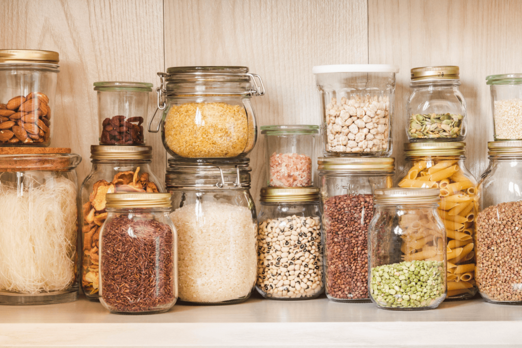 Shelf in the kitchen pantry with various cereals and seeds