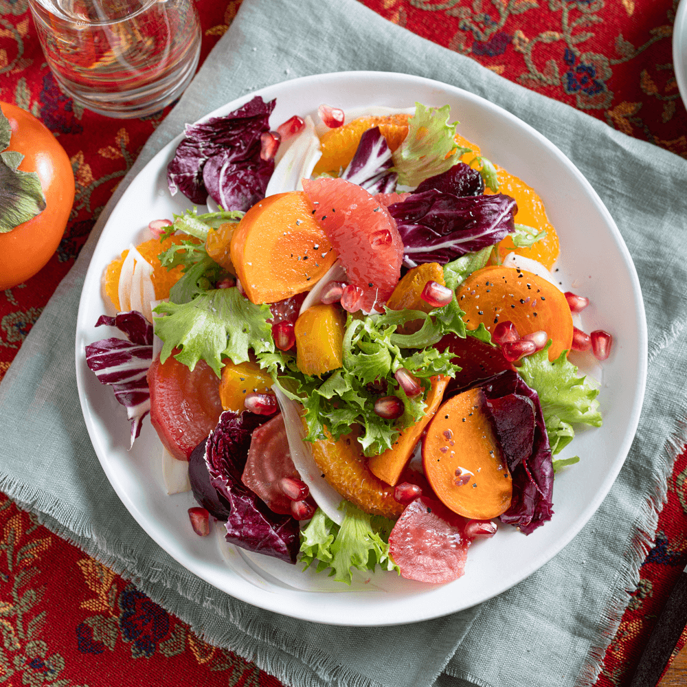 Elevate your table with our Persimmon, Beet, and Radicchio Salad! Featuring roasted beets, juicy citrus, crisp greens, and Farm Boy™ Red Wine Vinaigrette, it's a vibrant, flavour-packed dish perfect for any occasion.