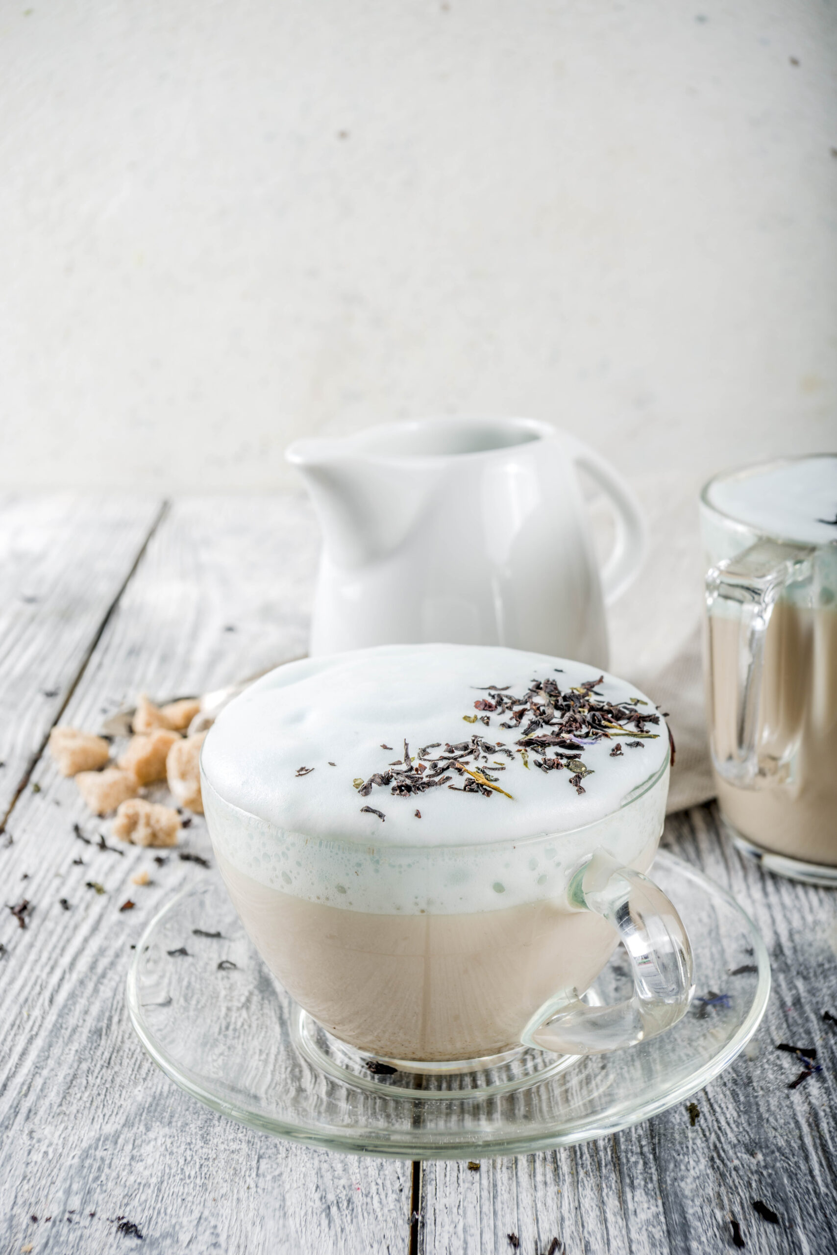 Tea latte, Earl Grey Hot London Fog Tea Drink with Foamed Milk, wooden background copy space
