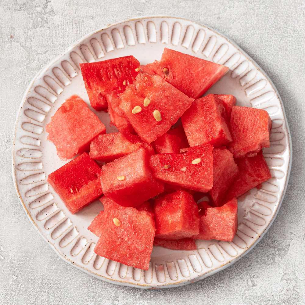 Overhead image of plate of cut watermelon