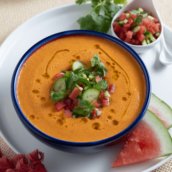 Bowl of Watermelon Tomato Gazpacho with watermelon garnish
