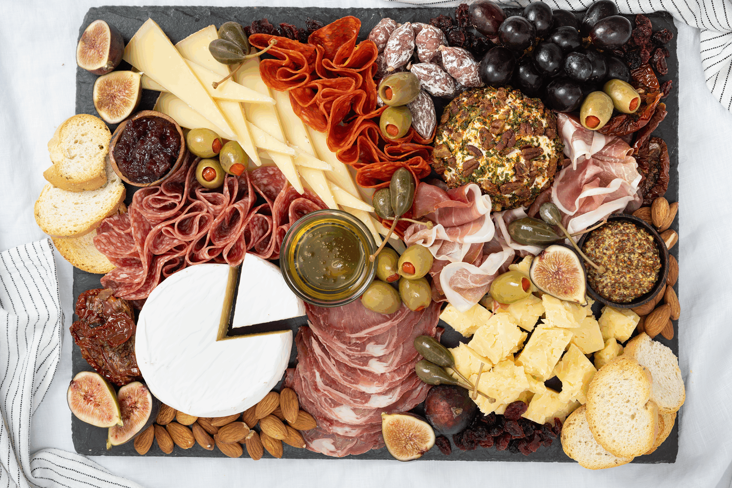Charcuterie board loaded with Farm Boy Private Label Products. 