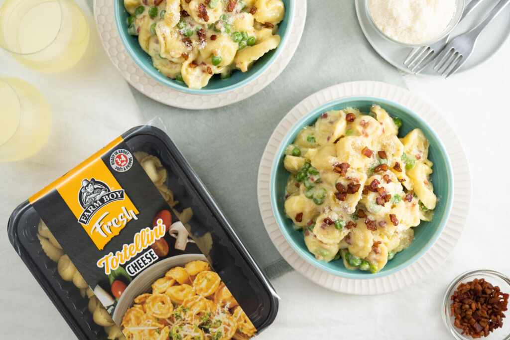 Overhead image of two bowls of tortellini with package of Farm Boy Fresh Tortellini