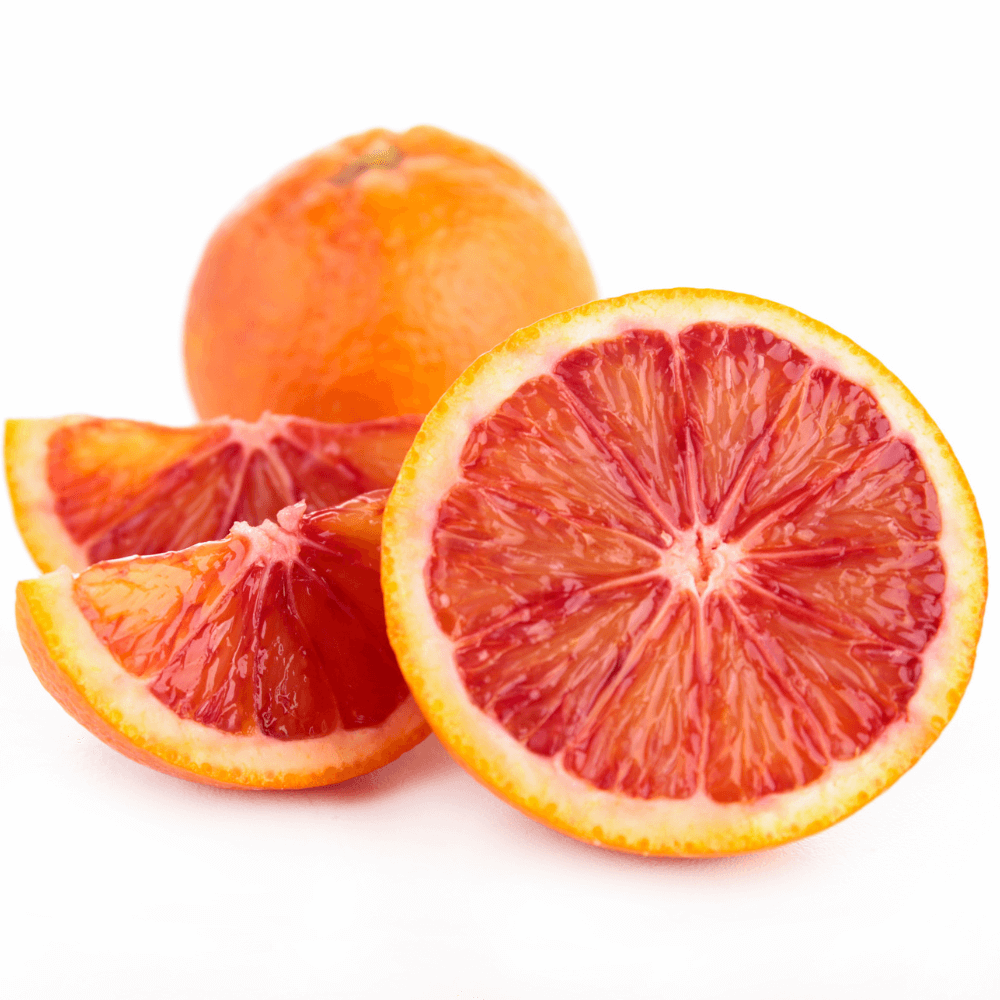 whole and slices of blood oranges on white background