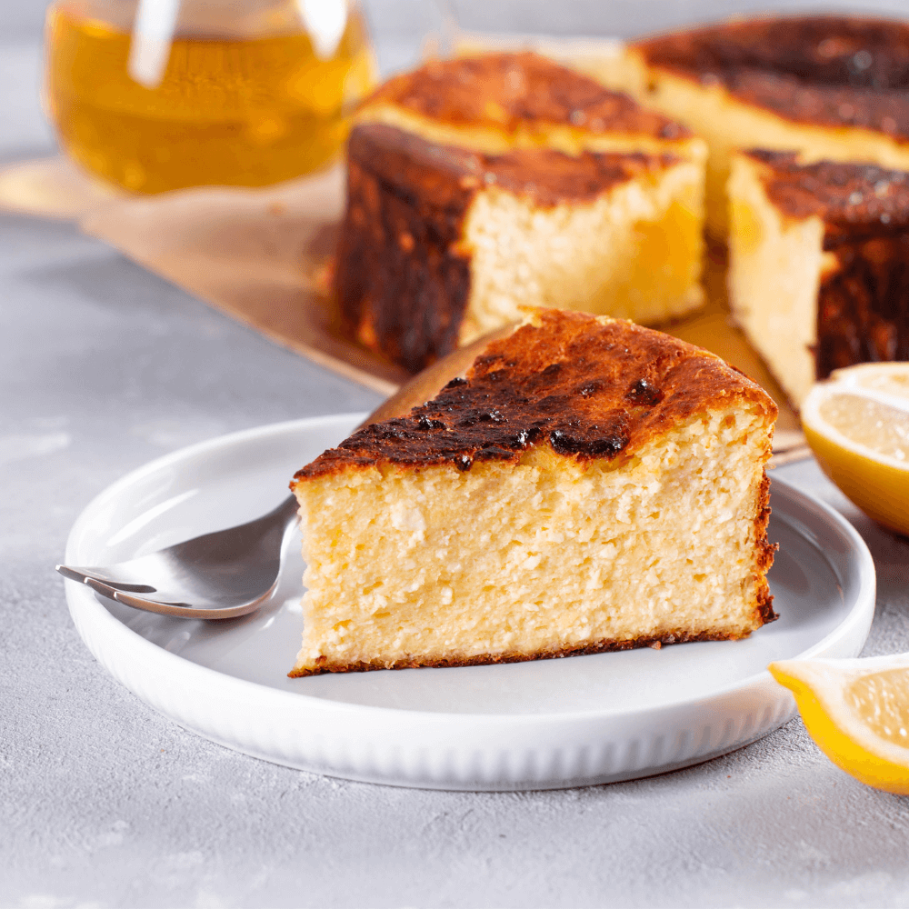 Fluted plate with slice of Basque Style Cheesecake