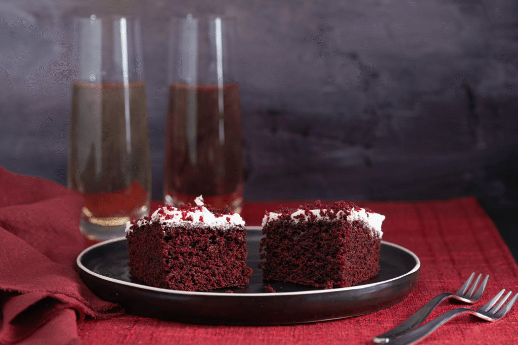 Plate with two squares of red velvet cake for Valentine's Day