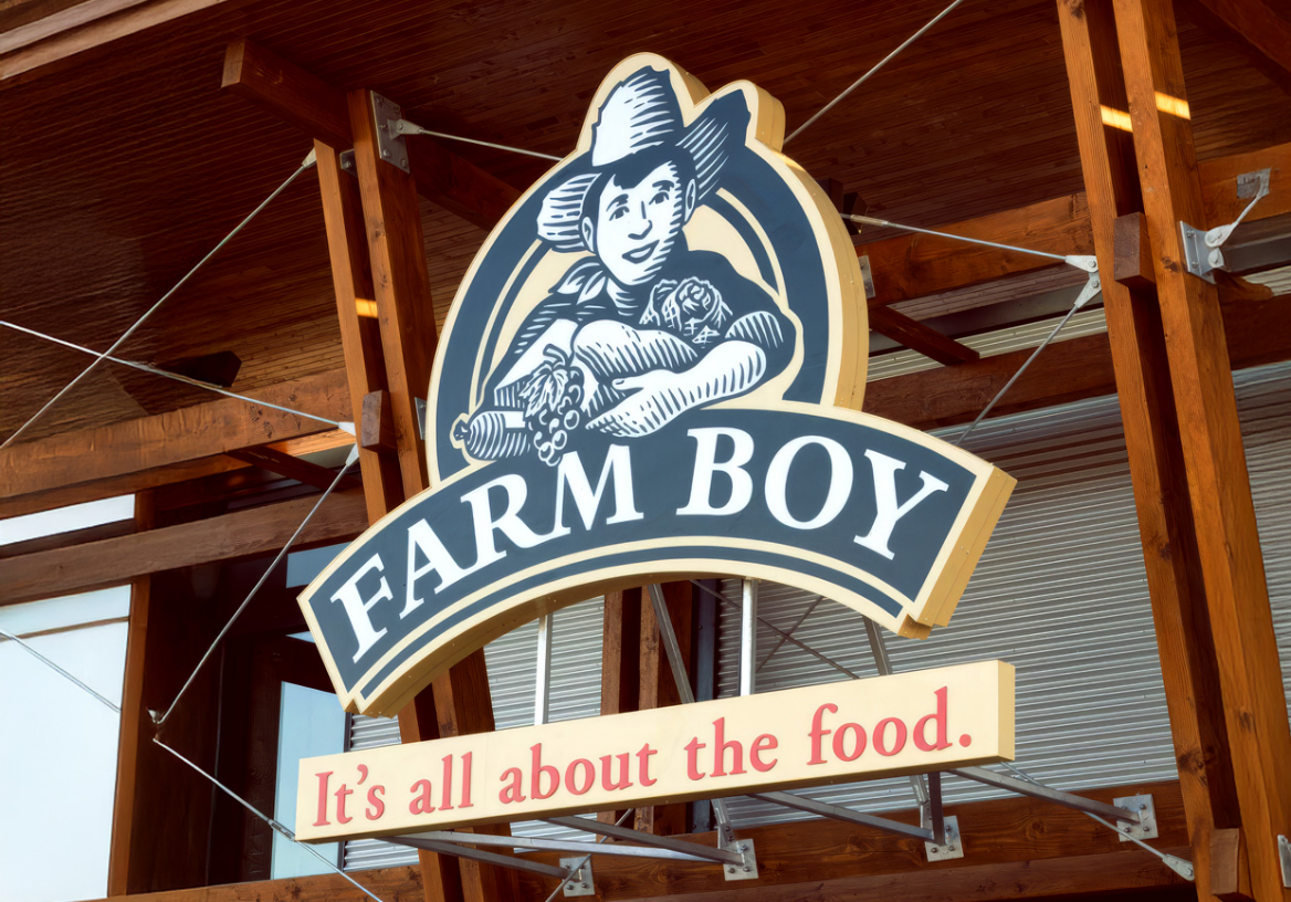 Farm Boy sign on store front.