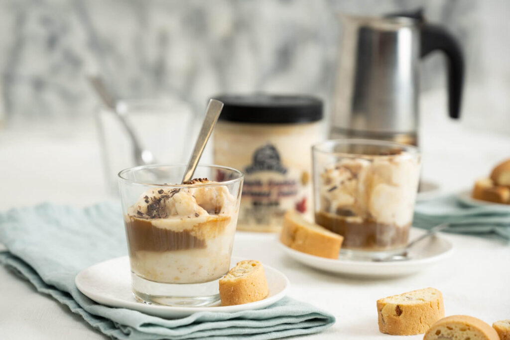 Short glass filled with Farm Boy Maple Cookie Gelato topped with espresso, biscotti, and shaved chocolate