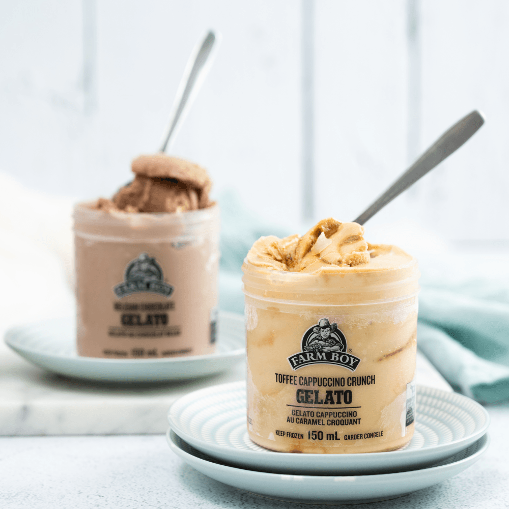 Two single serving containers of Farm Boy Gelato with spoons