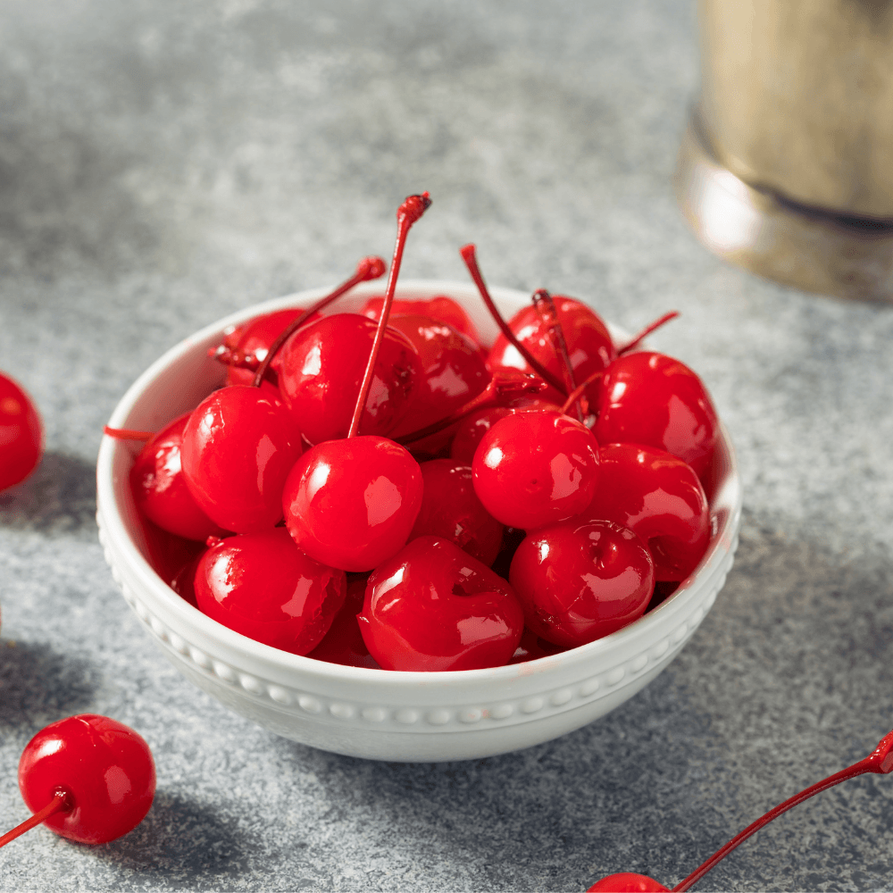 Sweet Candied Red Maraschino Cherries in a Bowl